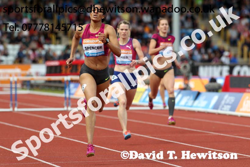 Kaliese Spencer on her way to winning the womens 400 metres hurdles at the Sainsbury's Birmingham Grand Prix. Photos: David T. Hewitson/Sports for All Pics